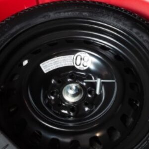 Traba de seguridad de rueda auxilio